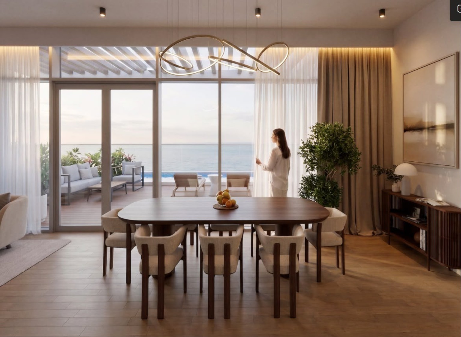 Contemporary dining room connected to an outdoor waterfront terrace